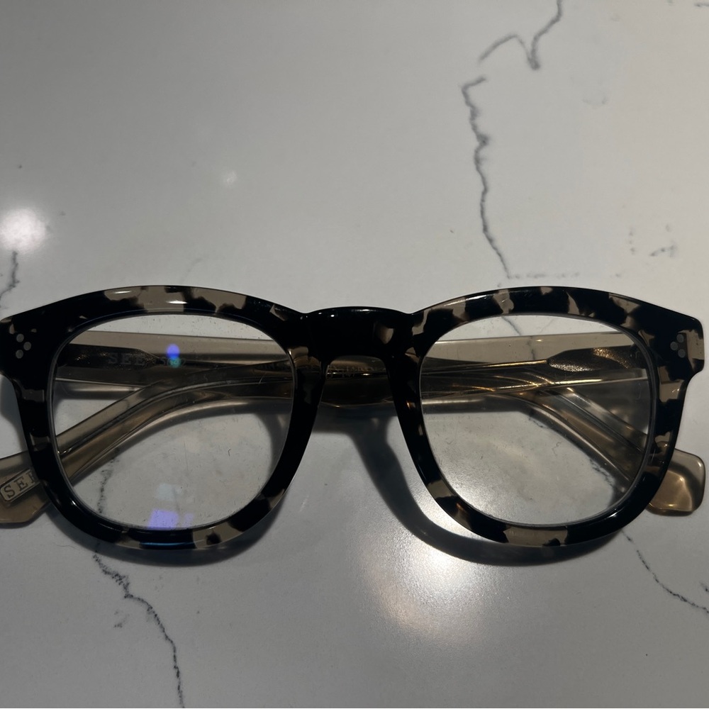SEE 5642 Eyeglasses with prescription, selling for the frame.
